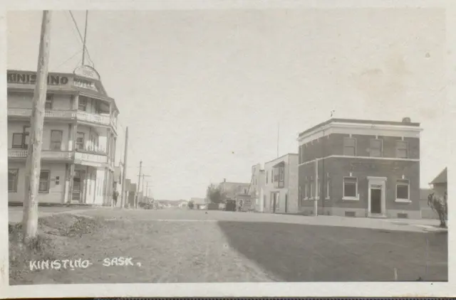 Street view with Kinistino Hotel and brick bank building